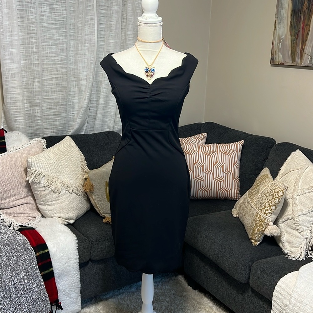 Emeral sundae black mini dress